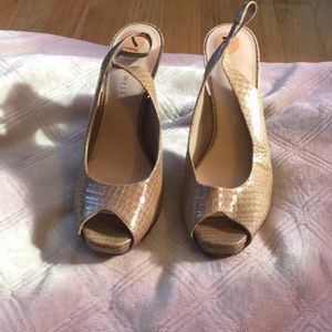 Peep toe heeled shoes